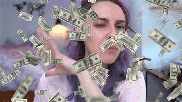 a woman with purple hair is surrounded by hundred dollar bills