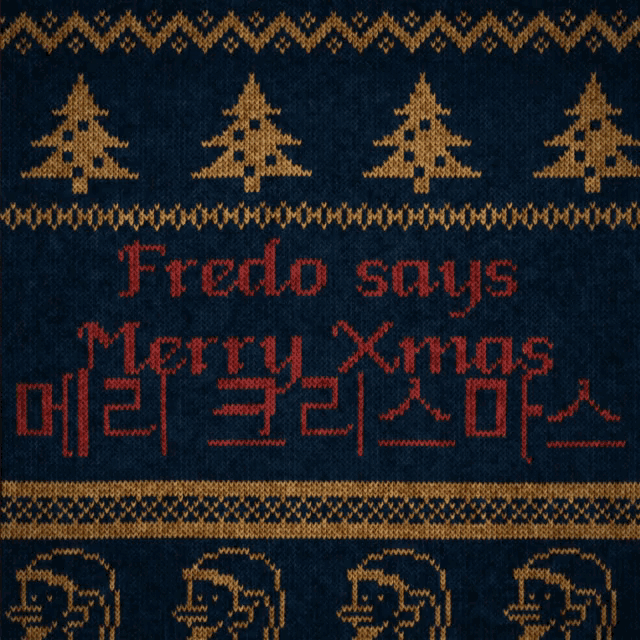fredo says merry xmas in red on a blue background