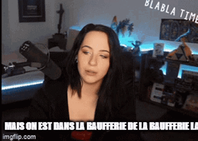 a woman in front of a microphone with the words mais on est dans la baufferie de la baufferie la on the bottom