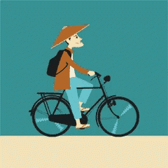 a man in a conical hat is riding a bicycle