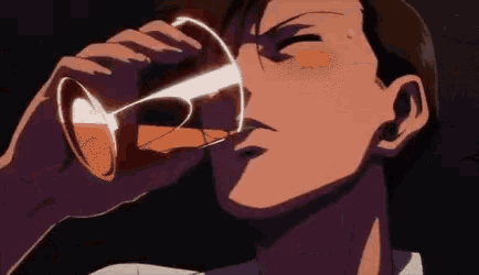 a man is drinking from a glass with a glowing light coming out of it .