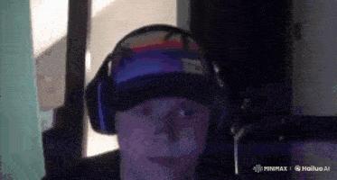 a man wearing headphones and a hat with the word hailuo ai on the bottom right