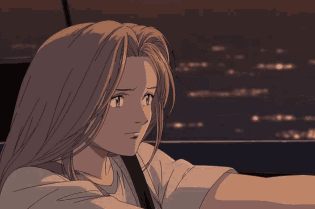 a girl with long blonde hair is sitting in a car looking out the window