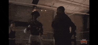a man in a boxing ring with the word new south on the bottom