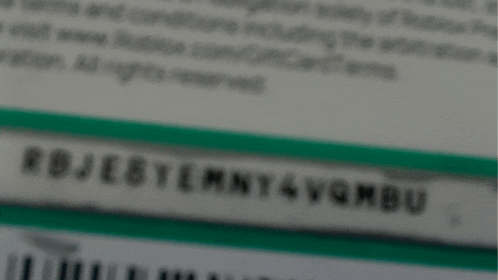 a blurred image of a card with the letters rbje8temny4vgmbu on it