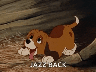 a cartoon dog is laying on the ground with its tongue out and the words `` jazz back '' written above it .