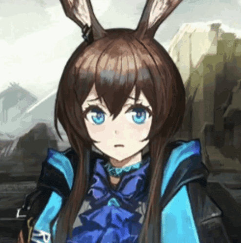 a girl with bunny ears and blue eyes is wearing a blue jacket .