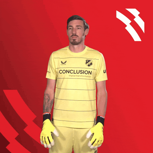 a man wearing a yellow shirt that says conclusion