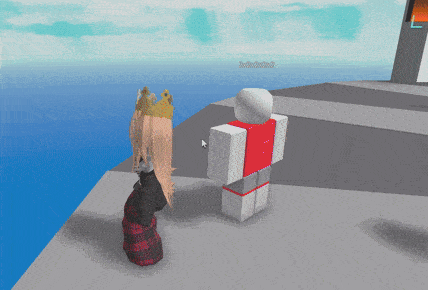 a girl with a crown on her head is standing next to a roblox character