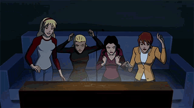 a group of cartoon characters are sitting on a couch