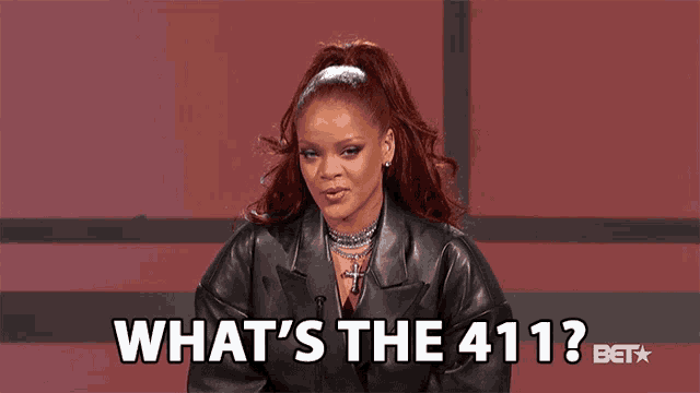 a woman in a black leather jacket is asking what 's the 411