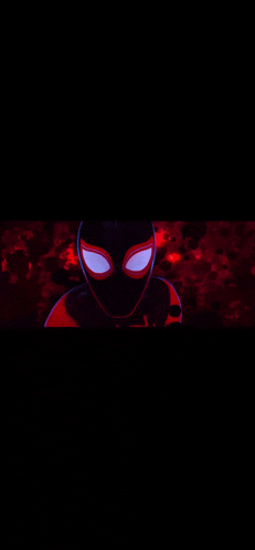 a close up of a person 's face with glowing eyes in the dark