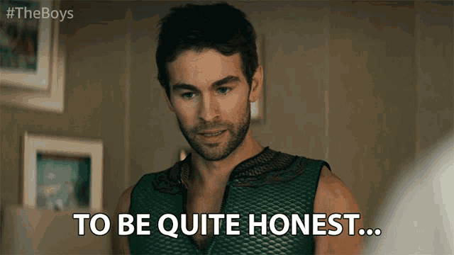 a man says " to be quite honest " while wearing a green vest