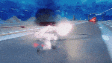 a blurred image of a person riding a bike on a road