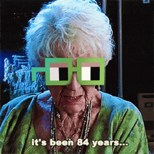 an elderly woman wearing a pair of glasses that say it 's been 84 years