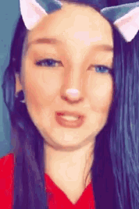 a woman with cat ears on her face