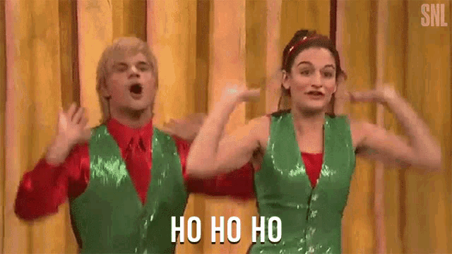 a man and a woman are dancing together on a stage and the man is saying ho ho ho .