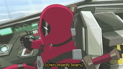 deadpool is sitting in the cockpit of a car and crying manly tears