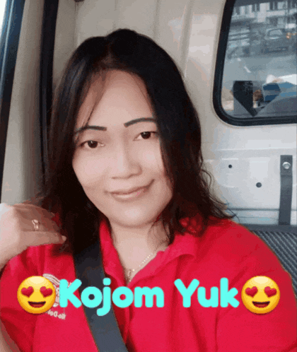 a woman in a red shirt with the name kojom yuk