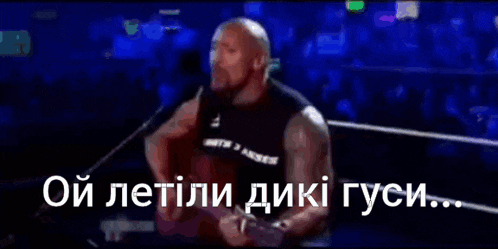 a man in a boxing ring with the words " oy letili diki gusi " written on the bottom