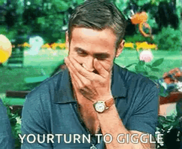 a man is covering his mouth with his hand and the words `` yourturn to giggle '' are written above him .
