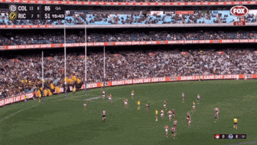 a soccer game is being played in a stadium with drinks for game day sorted advertisements