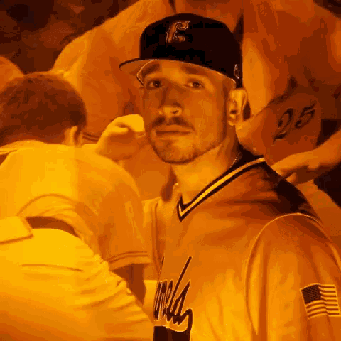 a man wearing a jersey that says ' andy ' on it