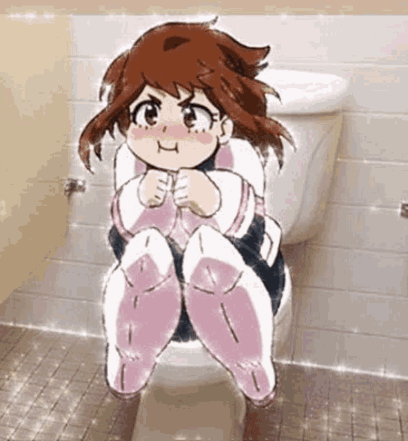a girl is sitting on a toilet in a public restroom .