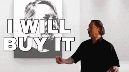 a man is standing in front of a picture that says i will buy it