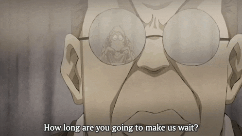 a man wearing glasses is asking how long are you going to make us wait
