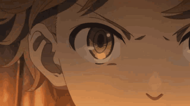 a close up of a person 's face with a very angry look on their face