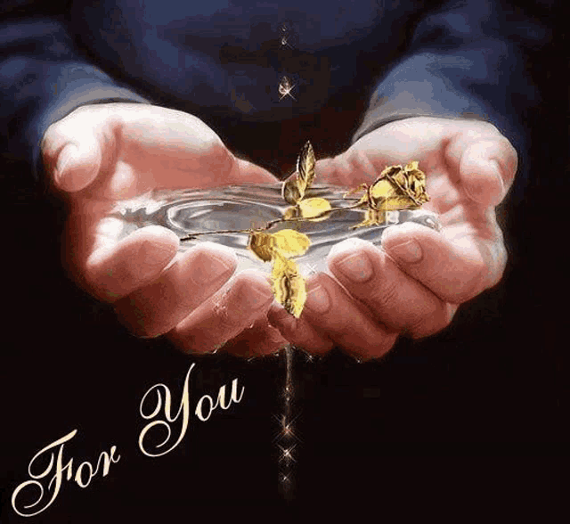 a person is holding a rose in their hands with the words for you written below them