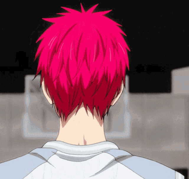 the back of a person with red hair is shown
