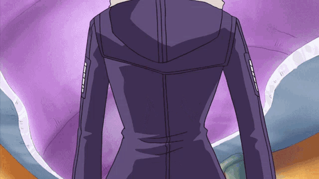 a person in a purple jacket with a hood