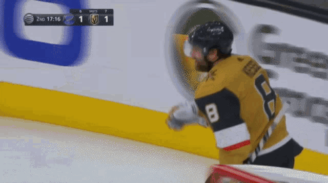 a hockey player with the number 8 on his shirt