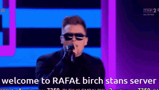 a man singing into a microphone with the words welcome to rafat birch stan server