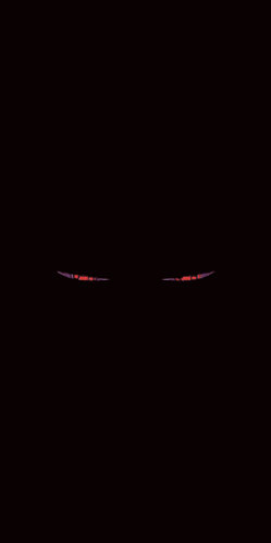 a pair of eyes with a spiral pattern on them on a black background