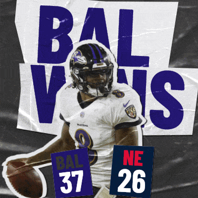 a ravens football player is holding a ball in front of a banner that says balvis