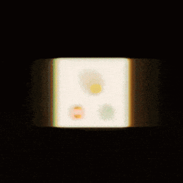 a slice of bread with a yellow circle in the middle of it