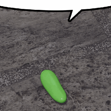 a green jelly bean with a speech bubble behind it
