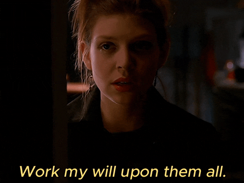 a close up of a woman with the words work my will upon them all