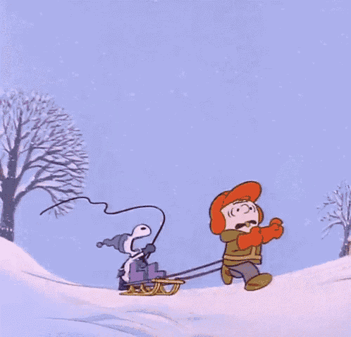 a cartoon of snoopy pulling a snowman on a sled