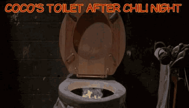 a toilet with flames coming out of it and the caption `` coco 's toilet after chili night '' .