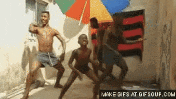 a group of men are dancing in front of an umbrella .
