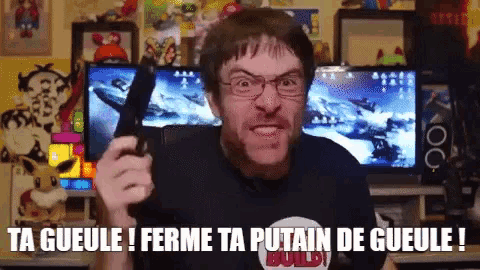 a man holding a gun with the words ta gueule ! ferme ta putain de gueule ! below him