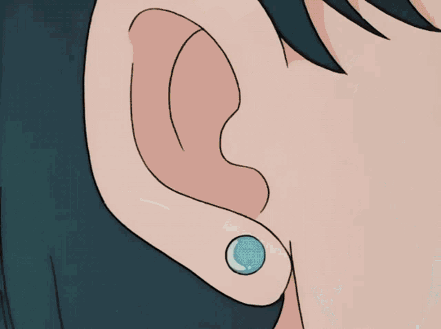 a close up of a girl 's face with a blue hair