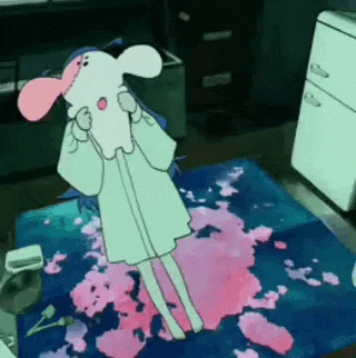 a cartoon character is standing on a rug in a room with pink paint on it .
