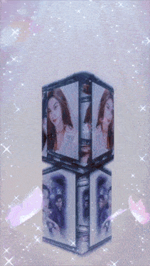 a cube with a picture of a woman and two men on it