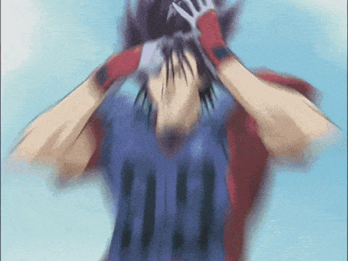a blurry image of a person holding their head