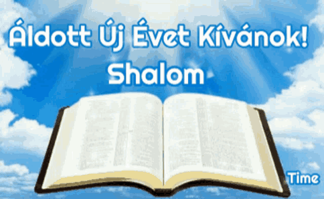a picture of an open bible with a blue sky in the background and the words " aidott új evet kivanok shalom "
